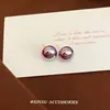 Pendientes de perla roja Zixia de alta gama simples para nicho, pendientes versátiles de temperamento para mujer, pendientes de perla tipo pan al vapor de alta gama