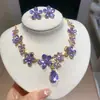 Pendientes y collar de gota de flor con incrustaciones de diamantes transfronterizos europeos y americanos, cadena para la clavícula de nicho de lujo ligero, juego de joyería para vestido de noche
