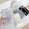 Novedad Primavera y Verano 2026 Estilo Japonés Simple Calcetines de Pantorrilla Blanco y Negro Gris para Mujer Verano Delgados Algodón de Secado Rápido