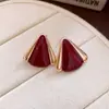 Pendientes de botón triangulares con gota de aceite de aguja plateada Pendientes versátiles de moda para el trabajo Pendientes de lujo ligero de alta gama Venta al por mayor