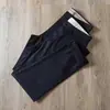 Pantalones casuales de primavera y verano para hombre, corte recto fino, antiarrugas, sin planchado, Tencel algodón, negocios, alta gama, elástico, pantalones negros