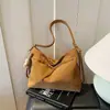 Bolsa Retrô Simples Transfronteiriça para Mulheres 2025 Nova Mochila Versátil para o Dia a Dia Bolsa de Ombro Multiuso Bolsa Tote
