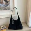 Bolsa de mão de nicho de alta qualidade estilo coreano transfronteiriça para mulheres 2026 bolsa quadrada pequena bolsa de ombro bolsa de mão casual de grande capacidade