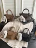 Moda Versátil Transfronteriza 2026 Nuevo Estilo Bolso Pequeño de Hombro Cruzado Estilo Cubo con Diseño de Bloques de Color Bolso de Hombro Cruzado Estilo Cubo