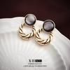 Pendientes de Piedra Ojo de Gato Geométricos Versátiles Estilo Retro Aguja de Plata Diseño de Personalidad de Nicho Pendientes de Lujo Ligero de Alta Gama para Mujer