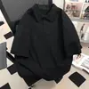 Camisa polo preta de manga curta com gola americana, algodão puro, marca tendência masculina de verão, camiseta estilosa e cool de alta qualidade com design de ombro reto