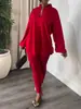 Moda Tricô Europeia e Americana Feminina 2026 Novo Conjunto de Duas Peças Elegante com Top de Gola V Dividido em Cor Sólida e Multicolorido e Leggings
