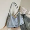 Bolsa Grande de Grande Capacidade Estilo Descontraído Nova 2026 Bolsa de Ombro Feminina para o Dia a Dia Bolsa para Estudante Universitário Bolsa Tote Simples