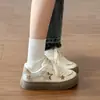 Estilo Coreano Alto Valor Design de Nicho Senso Estelar Sapatos de Lona com Estampa de Estrela Feminino Outono 2026 Novo Estilo Fashionável Versátil Estudante Sapatos Brancos