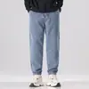 Jeans casuales elásticos para hombre de otoño y primavera, nuevo estilo 2026, pantalones de trabajo cropped con pernera cónica, adecuados para el verano
