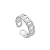 Anillo abierto ajustable de acero inoxidable hueco estilo europeo y americano para mujer, doble capa, temperamento, personalidad, diseño de nicho, anillo para el dedo