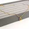 Moda europea y americana 26 letras collar de acero inoxidable oro plata cadena de clavícula de lujo ligero joyería de acero de titanio venta al por mayor