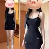 Vestido de tirantes negro Pure Sweet Spicy Bow 2025 Verano Aspecto Delgado Delgado Sexy Cintura Ceñida Chica Picante Corto