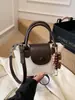 Bolsa de Mão Pequena Exquisita e Moderna Transfronteiriça para Mulheres Novo Modelo 2025 com um Toque Vintage de Alto Padrão, Bolsa Transversal Popular, Bolsa Mais Vendida, Pequena Bolsa Tote