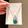 Resplandor de Cristal~ Juego de Aretes y Collar de Zirconia Ovalados con Plumas, Exquisita Cadena para Clavícula Estilo Palacio, Juego de Alta Gama para Mujeres