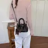 Bolso Pequeño de Alta Gama para Mujer 2026 Nuevo Bolso de Hombro Cruzado de Moda Tendencia Estilo Coreano Versátil Bolso de Mano para Viajes Diarios Bolso Cubo