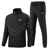 Traje Deportivo de Moda con Raya Reflectante para Hombre, Primavera y Otoño, Ajuste Holgado, Chaqueta Cortavientos con Cuello Alto y Pantalones, Versión Casual para Correr en Pareja