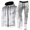 Colección Otoño/Invierno 2026: Sudadera deportiva unisex de lunares con forro polar, conjunto de sudadera con cremallera y pantalones de chándal de color liso para hombre