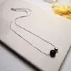 Collar de dos piezas de piedra de ágata negra natural de plata S925, cadena de clavícula europea y americana, collar de pareja simple y exquisito para hombres y mujeres.