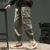 Pantalones cargo casuales cropped funcionales versátiles multibolsillos de comercio exterior transfronterizo para hombre, estilo primavera y otoño, corte holgado, color liso