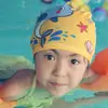 Variedad de animales de dibujos animados para niños y niñas, gorro de natación de moda, lindo para niños, cabeza alta, tela elástica impresa, gorro de natación al por mayor