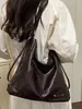 Bolso de hombro liso nuevo para principios de otoño de 2026 para el trabajo y los desplazamientos, bolso cruzado personalizado informal de gran capacidad a la moda
