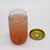 Fabricante de Foshan vende al por mayor botellas de plástico PET, frascos de empaque redondos para té de leche y jugos, latas transparentes comerciales de fácil apertura