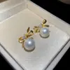 Aretes de Lazo con Goteo de Aceite de Aguja Plateada para Mujer, Aretes Dulces, Delicados y Elegantes con un Toque de Lujo Ligero y de Alta Gama, Presentando un Diseño Único