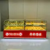 Nuevo Gabinete de Exhibición de Pastelería China con Recubrimiento de Titanio Madera Maciza Pintada Acero Inoxidable Galletas de Durazno Mostrador Refrigerado de Pastelería y Pan