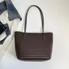 Bolsa tejida Shuai Mi Jia estilo retro de gran capacidad, nuevo modelo de otoño 2026, bolso de un solo hombro, bolsa de mano simple para el día a día