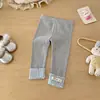 Calça Legging Dianxi Spring Estilo Novo para Bebês e Crianças Pequenas com Punhos Patchwork para Meninas, Calça Estilosa e Versátil com Estampa de Desenho e Borda Enrolada Tendência