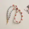 Ins Bolso Tejido Hecho a Mano de Margarita Perlada con Correa para Teléfono Móvil Mochila Cruzada de Mano con Flor Tejida con Llavero