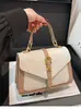 Nova moda transfronteiriça cinto trançado moderno estilo coreano bolsa de ombro única casual cor sólida para o início da primavera bolsa quadrada pequena transversal