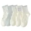 Nuevos calcetines azules de primavera y otoño para mujer, de longitud media hasta la pantorrilla, transpirables, estilo japonés y coreano, estilo deportivo trendy de Instagram, calcetines largos con lazo para mujer