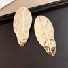 Pendientes de Botón Geométricos Irregulares Exagerados de Metal con Superficie Brillante, Estilo Nuevo 2026, Pendientes de Personalidad, Sentido del Diseño, Adornos para Orejas