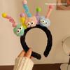 Divertida diadema de felpa de dibujos animados para mujer, linda muñeca fea, pasador para alta presión craneal, diadema para lavar la cara, especial para recoger el cabello al por mayor