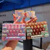 Estación de Alivio del Estado de Ánimo Alivio del Estrés Botón de 26 Teclas Color Dopamina Juguete de Presión con la Punta del Dedo Colgante Venta al por Mayor