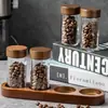 Frascos de almacenamiento de madera de acacia para uso diario, frascos de cocina transparentes de alto borosilicato con tapas, juego de 4 piezas con base para especias
