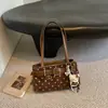 Bolsa de Ombro Única com Bolinhas Retro Fofa Feminina 2026 Novo Design Sensação Bolsa de Axila Moda Bolsa de Mão para o Dia a Dia