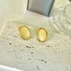 Pendientes Doudou de piedra de ojo de gato de estilo corte retro francés, pendientes elegantes de círculo geométrico de nicho femenino de alto sentido, al por mayor
