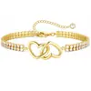 Pulseira de Coração Enrolado com Zircônia Inserida em Cobre para Comércio Exterior Europeu e Americano Nova Moda Exquisita Simples Generosa Estilo Versátil Joia de Mão para Mulheres