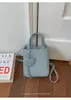 Bolsas de Diseño de Nicho para Mujer 2026 Nuevo Verano Versátil Bolso Cruzado Super Venta Caliente Pequeño Bolso Cuadrado de Mano para el Trabajo