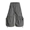Directo del fabricante: Pantalones cortos de trabajo estilo americano con cordón y correa, diseño plisado, corte cropped para hombres y mujeres, con bolsillos grandes y piernas anchas, shorts de verano