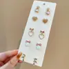 Brincos de Coração com Laço Cravejados de Diamante e Pérolas Estilo Coreano Conjunto de Dez Peças, Brincos Modernos e Versáteis, Brincos de Luxo Leve e de Alta Qualidade para Mulheres