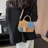 Diseño de nicho tendencia de moda bolso pequeño portátil para mujer moda primavera y verano 2024 Bolso cuadrado pequeño de mezclilla textura de alta calidad único