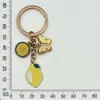 Colgante de Limón de Fruta de Dibujos Animados Transfronterizo Colgante Decorativo para Mochila Llavero de Aleación con Goteo de Aceite Joyería Pequeña Venta al por Mayor en Stock