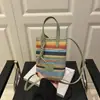 Bolsa feminina estilo coreano listrada, nova chegada, primavera e verão 2025, bolsa de ombro trançada, transversal, bolsa para celular
