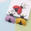 Llavero Divertido y Creativo de Cuero de Insecto Mariquita Lindo Colgante de Bolso Mariquita de Siete Puntos Llavero