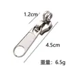 Fabricantes de Zhejiang 5# cabeza de cremallera de ojo de cerradura de nylon Estuche de equipaje Cremallera Candado de Metal cabeza de cremallera especial