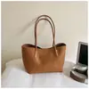 Bolsa de Ombro Texturizada de Cor Sólida Feminina 2026 Novo Estilo Grande Capacidade Simples Bolsa de Ombro Nicho Retro Bolsa Tote para o Dia a Dia